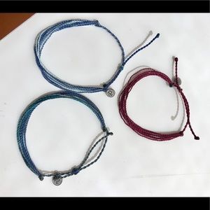3 assorted Pura Vida bracelets